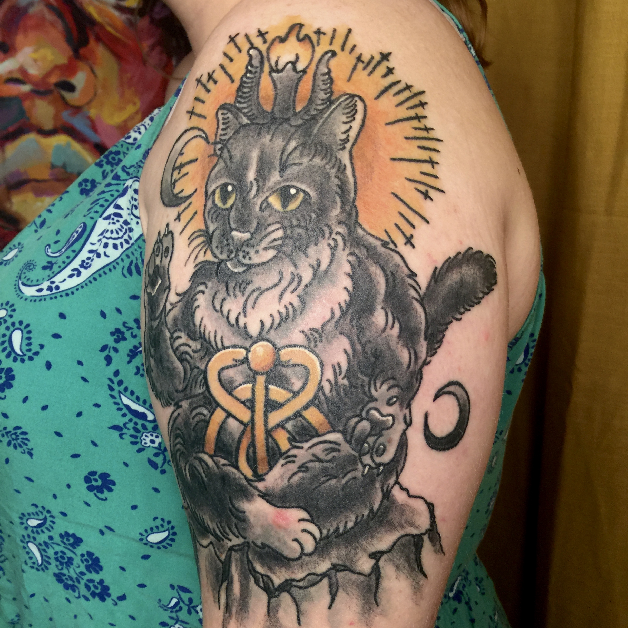 A tattoo of Baphomet as a cat