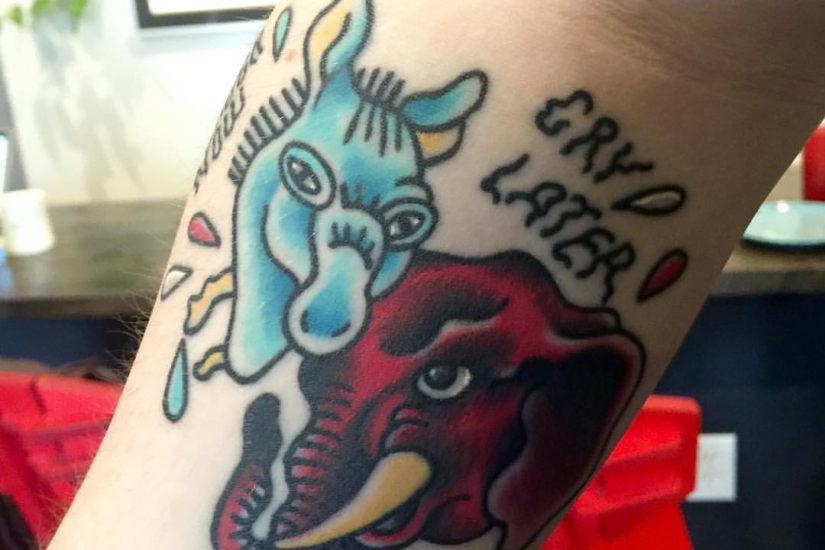 Photo of a elephant and donkey tattoo